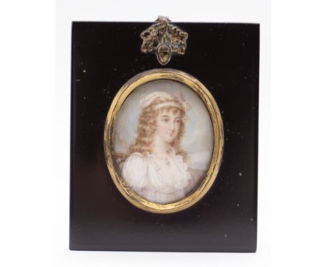 English School (early 19th Century) Portrait miniature of a Lady, white headdress and dress with lace bodice oval, 6cm long, 