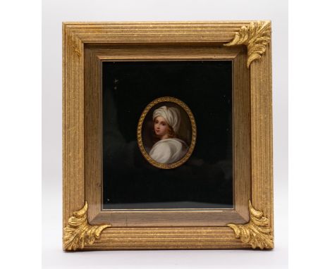 A KPM Berlin oval porcelain plaque portrait of a young lady wearing white headdress and robe, 7cm long, incised mark to rever