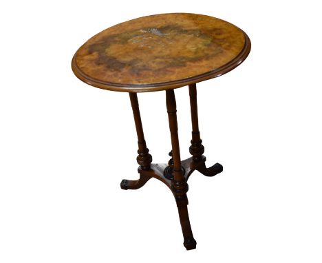 Victorian walnut round-topped wine table standing on three straight turned supports and three splayed legs with finial detail