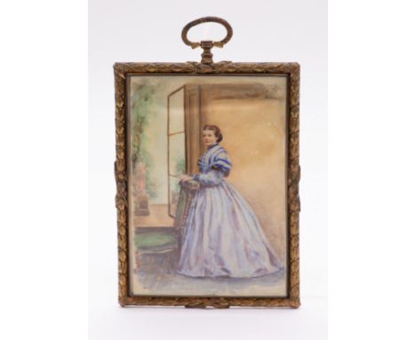 A 19th Century porcelain plaque painted with a full length portrait of a Lady wearing a blue dress leaning on a prie-dieu cha