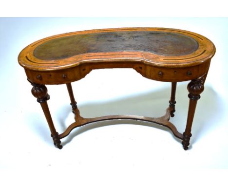 A mid-Victorian walnut and mahogany kidney-shaped ladies desk with brown leather writing top insert, inlaid detail with boxwo