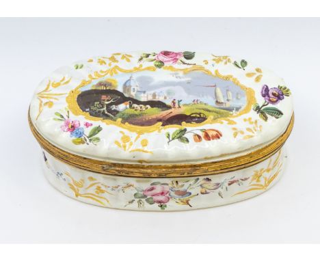 An 18th Century enamel probably London oval fluted gilt metal mounted snuff box and cover, circa 1770, the white ground decor