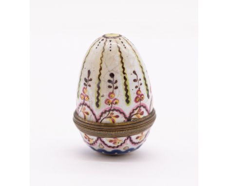 An 18th Century South Staffordshire gilt metal mounted enamel ovoid nutmeg grater and detachable cover,  circa 1790, the whit