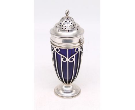 An Edwardian silver footed sugar caster, having elaborate stylised pierced casing, detachable top and ribbed finial, with ori