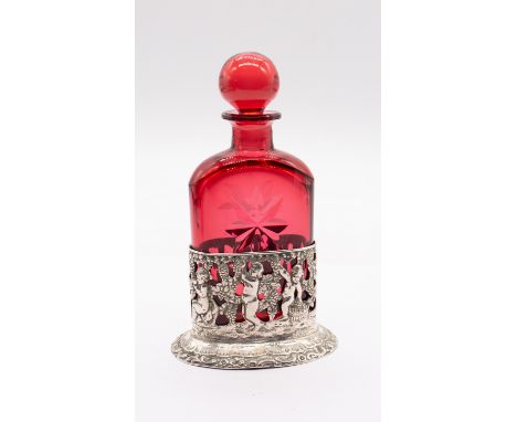 A late 19th Century 830 standard probably Hanau silver oval scent bottle holder, pierced and chased with cherubs carrying bun