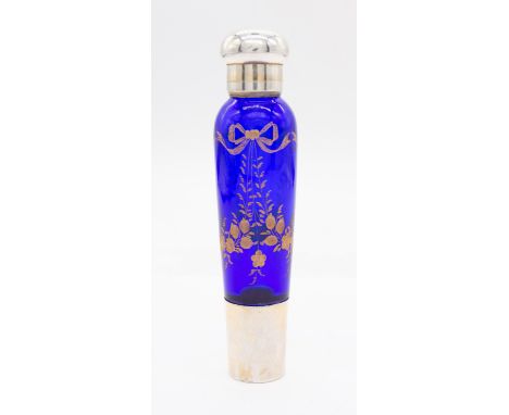 A 19th Century French silver mounted cobalt blue glass liqueur flask, the glass body etched with gilt ribbon tied floral fest