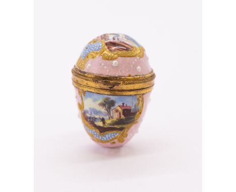 An 18th Century South Staffordshire gilt metal mounted enamel bonbonniere, circa 1790, egg shaped, the pink ground decorated 