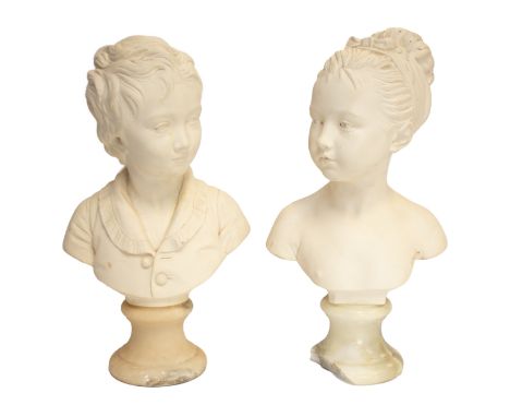 A pair of late 19th century alabaster busts of young children, one a boy wearing a cardigan and the other a girl with a bow i