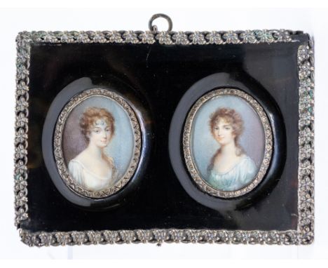 A pair of early 19th Century portrait miniatures depicting ladies (sisters), oval, on card, each 3.5cm long, within white met