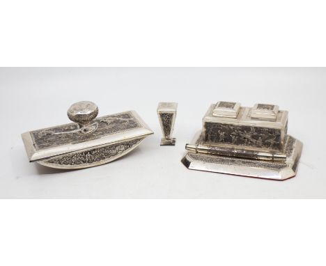 A matching 20th century Eastern white metal writing set consisting of double inkwell, blotter, seal and quil holder, all havi