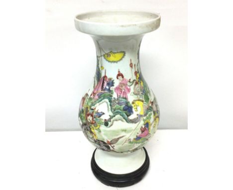 Large Chinese Famille Rose porcelain vase depicting an oriental scene with figures and horses, with stand. 43cm tall approxim