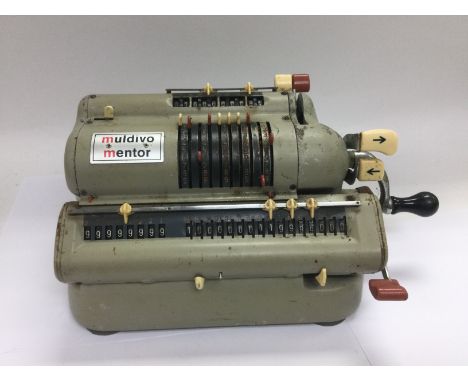 A vintage Muldivo Mentor calculator.Shipping category D.