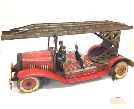 A 1950s english tin plate fire engine . Postage cat C