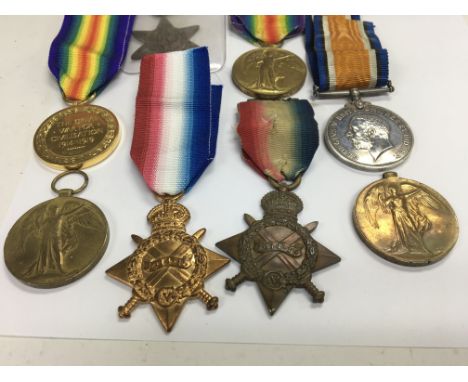 A collection of WWI medals, including two medals awarded to 282570 driver W.J.Edwards royal artillery, one medal awarded to G