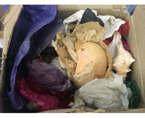 A Box Containing a collection of sea shells.