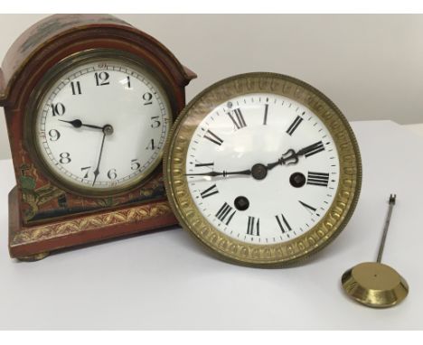 A red lacquer chinoiserie mantel clock Hight 15cm and a brass French clock movement with a pendulum. (2)