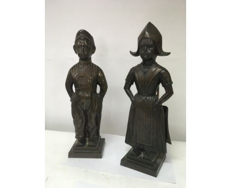 Two Dutch bronzed figures fire companies set with brushes fire poker to the reverse hight 53cm