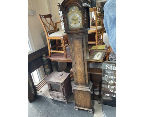 A 1950s oak granddaughter clock, Catagory D. 171cm. 
