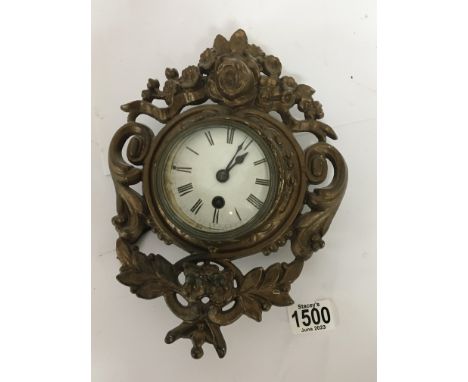 A late 19th century painted metal wall clock 28cm