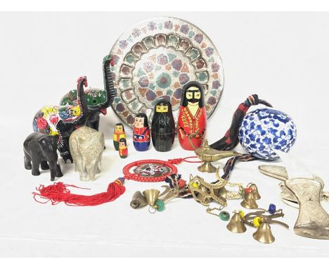 Modern Middle Eastern ornaments consisting of elephant figures, a Kutahya Turkish ceramic ball, a Jambiya dagger and other or
