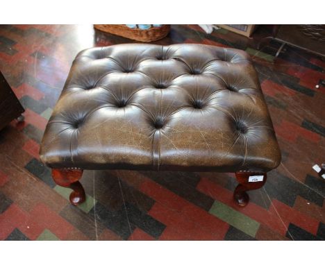 A good library leather effect button stool on short cabriole legs  