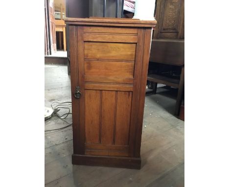 An early 20th century mahogany bedside table of elegant form, the door opening to reveal a shelf, H 78 cms, W 39 cms D 35 cms