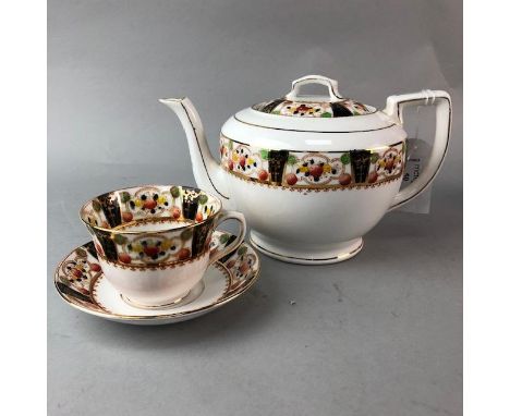 PART MELBA CHINA TEA SERVICE, decorated in red, green and gilt, including tea pot and cups
