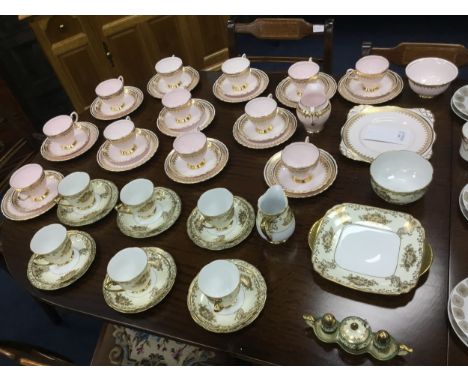 TUSCAN PART TEA SERVICE, with gilt decoration on a pink ground, along with a Meito China part tea service