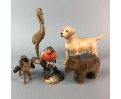 ROYAL CROWN DERBY FIGURE OF A ROBIN RED BREAST, 10cm high, along with a ceramic figure of a dog and three carved wooden anima