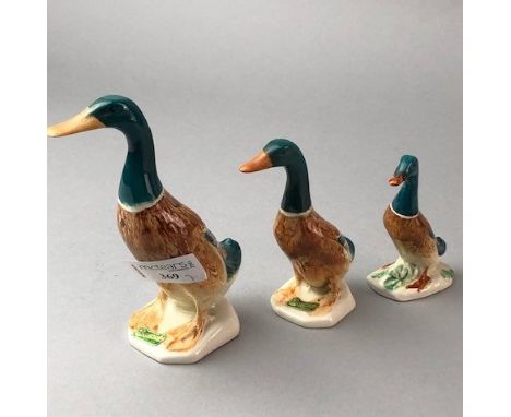 THREE BESWICK DUCKS, the tallest 15cm high, along with a Goebel figure of a robin, a Hornsey figure of a goat and a Beswick f