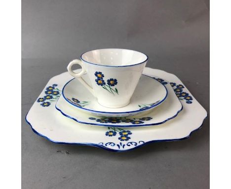 PART GLADSTONE CHINA TEA SERVICE, decorated with blue floral motifs, including cups and saucers