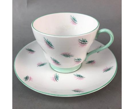 PART SHELLEY TEA SERVICE, decorated in green and pink, including cups, saucers and sugar
