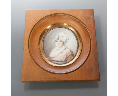 REGENCY PERIOD PORTRAIT MINIATURE
depicting a married gentlewoman, painted on card (or papier-mâché), 'HRM' and 'Domponat' wr