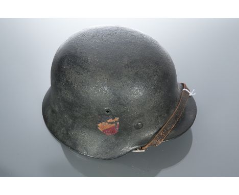 THIRD REICH DOUBLE DECAL STEEL HELMET
with brown leather lining and chin strap, 28cm long