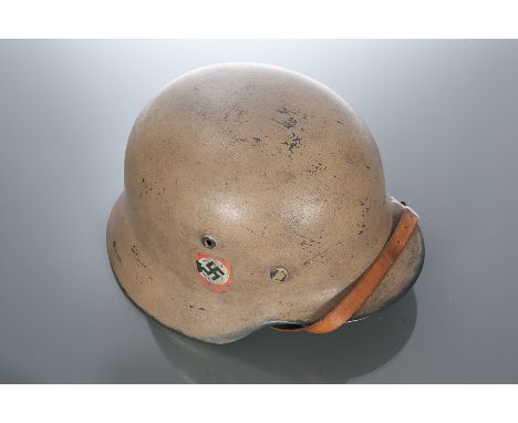 THIRD REICH DOUBLE DECAL STEEL HELMET
possibly Afrika Korps, the tan ground with the swastika and the National Socialist Part