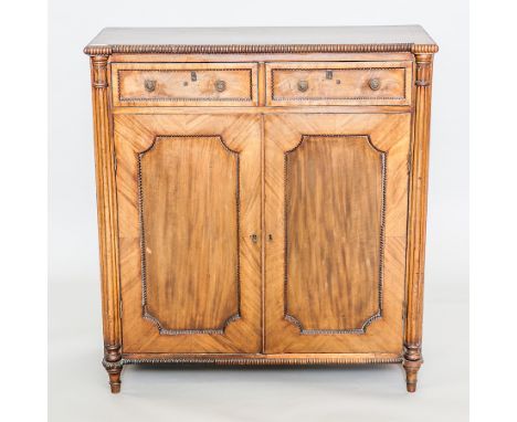 EARLY 19TH CENTURY MAHOGANY SIDE CABINET
two short drawers over a double door cupboard, gadrooned edges and borders, with two