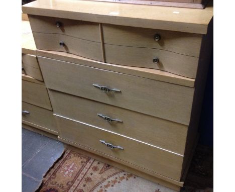 An Art Deco light oak veneer chest of drawers. W92cm D46cm H105cm.