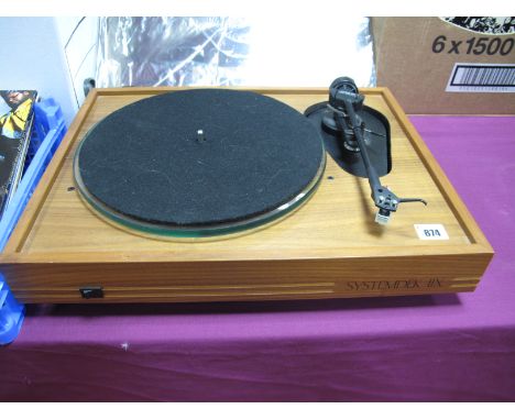 A Systemdek XII Turntable Serial No 206641, fitted with a Linn Basik Plus tonearm, boxed with instruction manual.