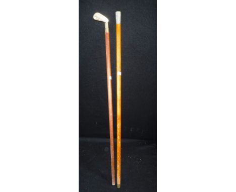 A REPRODUCTION GOLF CLUB WALKING STICK with spirit flask and another stick with military crest