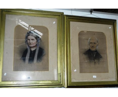 ENGLISH SCHOOL: A portrait of a Victorian woman wearing a bonnet, chalk on paper, with another similar study of a man