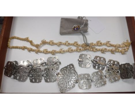 AN 18CT BLUE AND WHITE STONE RING and an Art Nouveau style plated white metal belt and a carved bone necklace