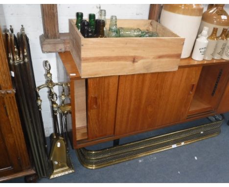 A 19TH CENTURY BRASS FENDER, a set of brass fire tools and a folding mesh covered fire guard