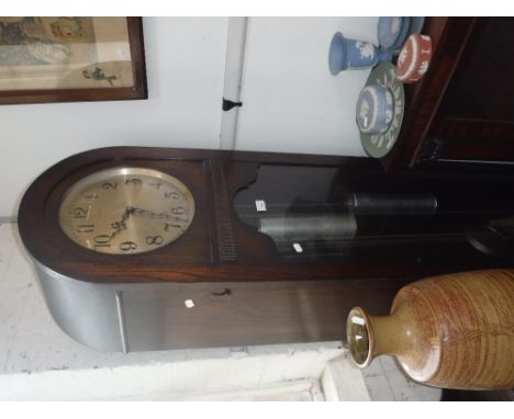 A 1920'S OAK-CASED THREE TRAIN LONGCASE CLOCK, by Enfield with silvered dial and domed top door