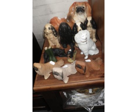 A COLLECTION OF CERAMIC AND RESIN DOGS, a quantity of collector's plates and a quantity of framed prints