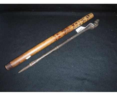 A SARAWAK BAMBOO ARROW TUBE and a carved wood 'Pig stick' (2)