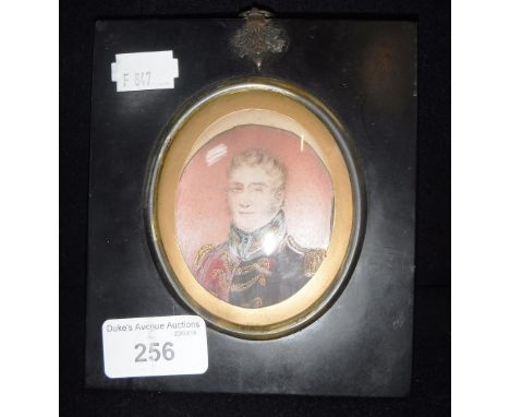 A 19TH CENTURY MINIATURE PORTRAIT OF AN OFFICER IN UNIFORM with period ebonised frame 