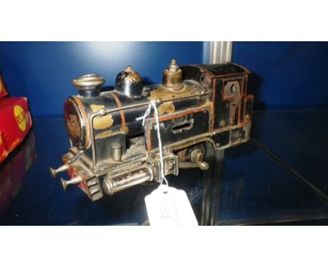 GEBRUDER MARKLIN: AN EARLY 20TH CENTURY 'O' GAUGE STEAM DRIVEN LOCOMOTIVE with worn dark blue paintwork, in original un-resto