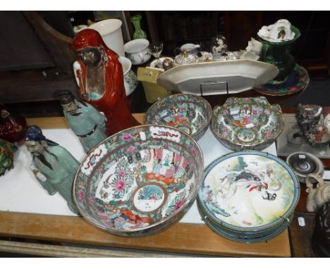 THREE CHINESE BOWLS, a collection of similar plates and three glazed Oriental ceramic figures