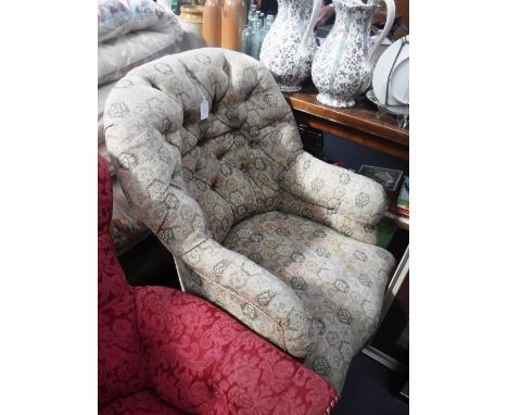 A VICTORIAN IRON FRAMED UPHOLSTERED BUTTON-BACK ARMCHAIR with carved rosewood legs