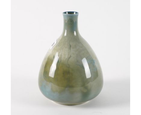 A ROYAL WORCESTER `SABRINA' WARE VASECirca 1909 Painted by W.Powell, signed, with fish swimming amongst reeds, green printed 